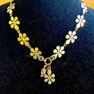 NWOT.  Local Artisan silver toned metal flower designed necklace.